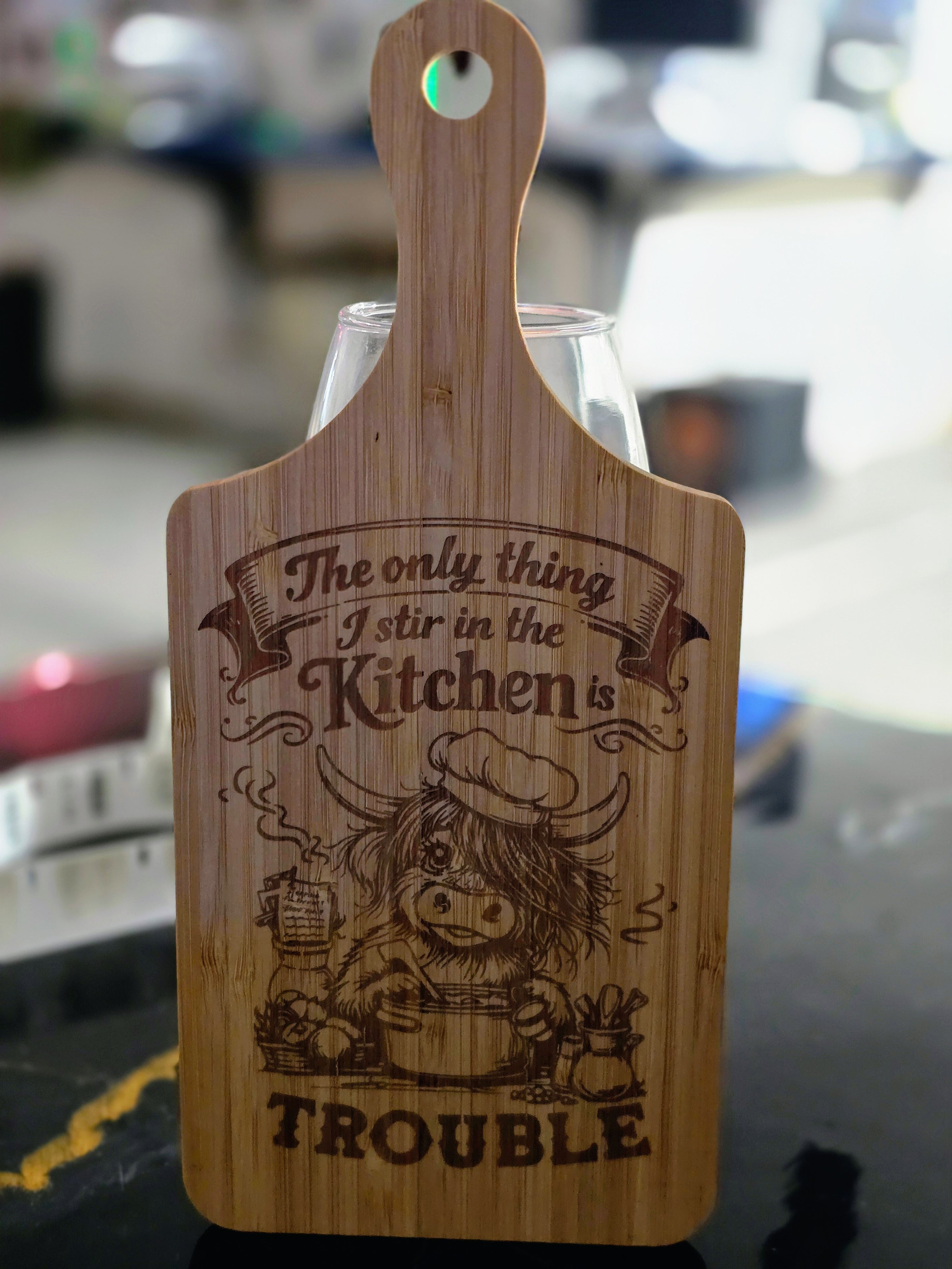 "The only thing I stir in the kitchen is trouble" Laser-Engraved Bamboo Cutting Board – 11" Decorative & Functional Kitchen Board